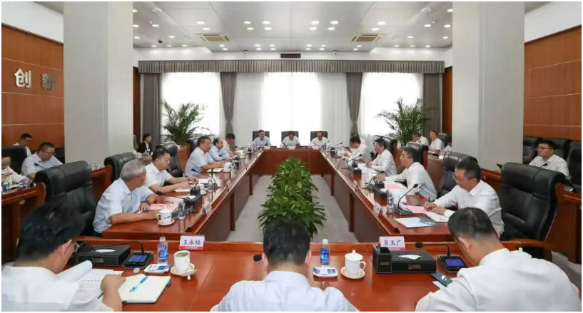 中核集团会见哈电集团董事长、党委书记黄伟一行